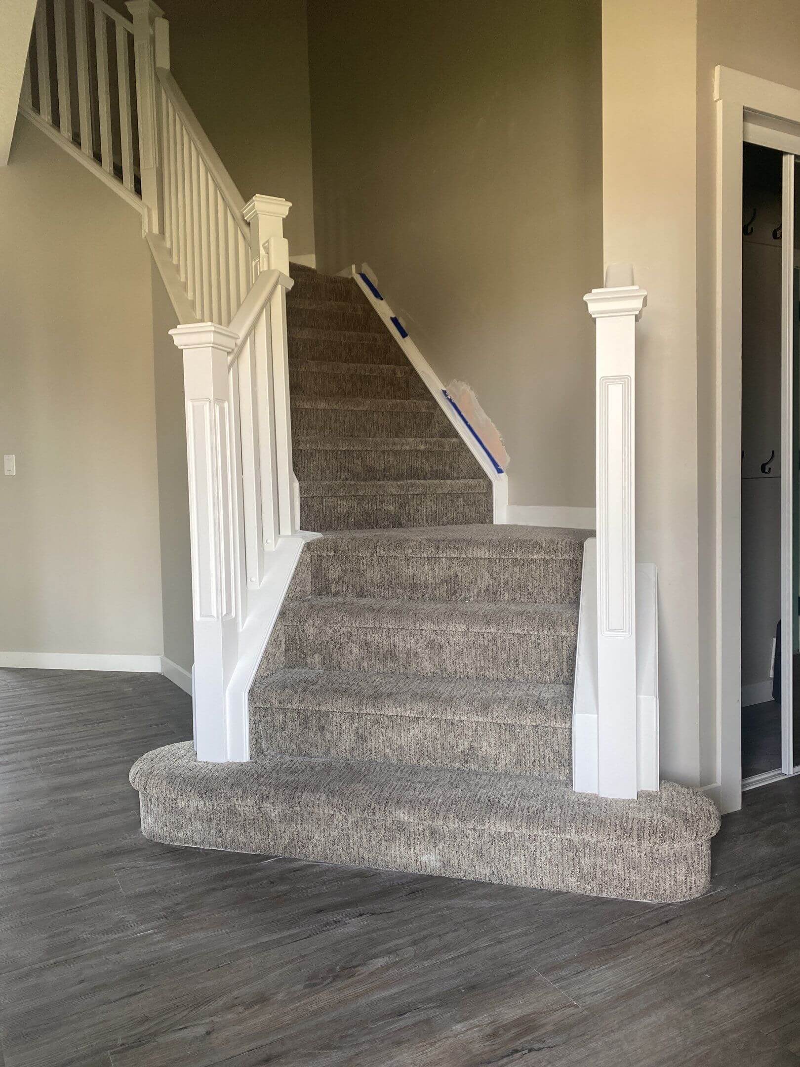 Banister rail staircase landing painted modern white Okotoks