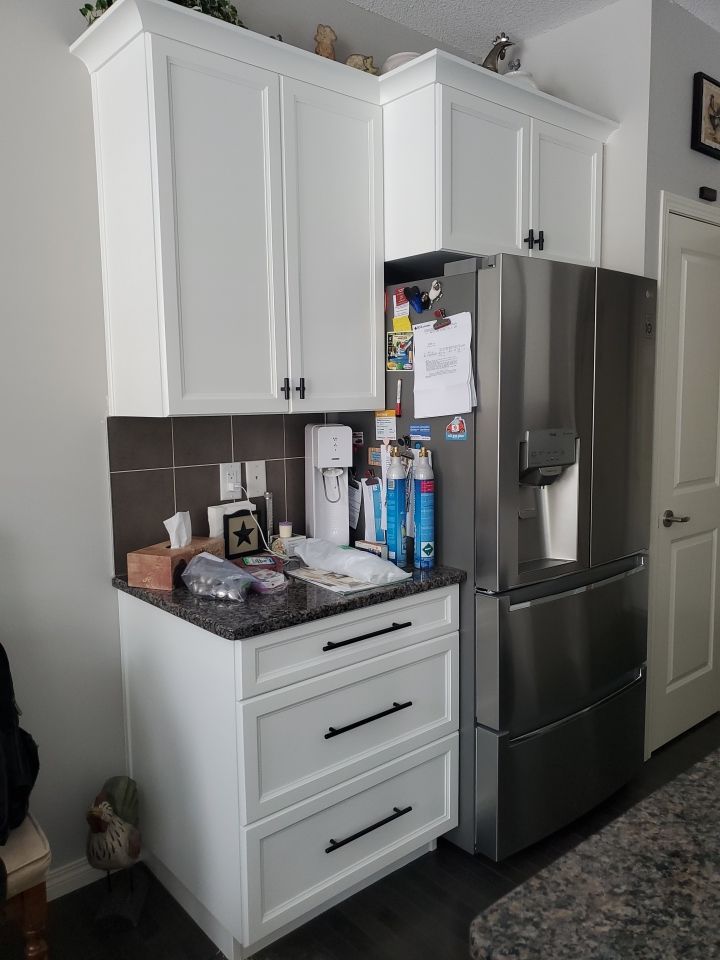 Dark Cabinets Repainted Off White after 7