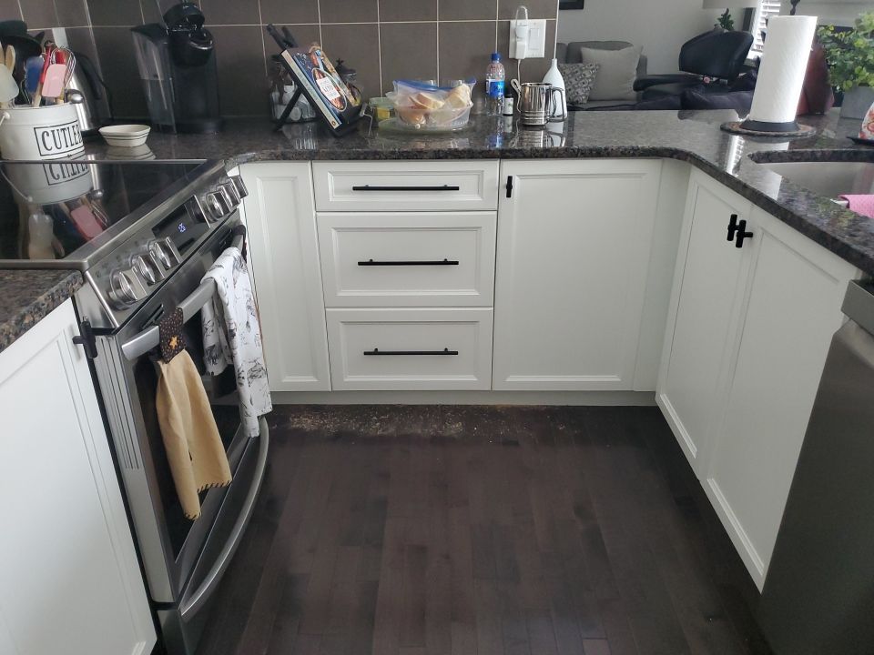 Dark Cabinets Repainted Off White after 4