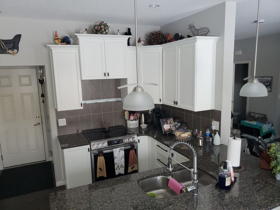 Dark Cabinets Repainted Off White after 6