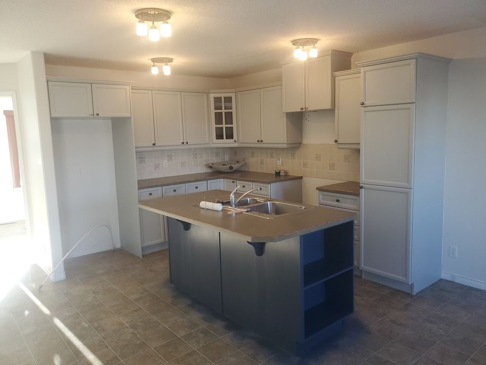 Orange Oak Cabinets Painted Two Tone after 1