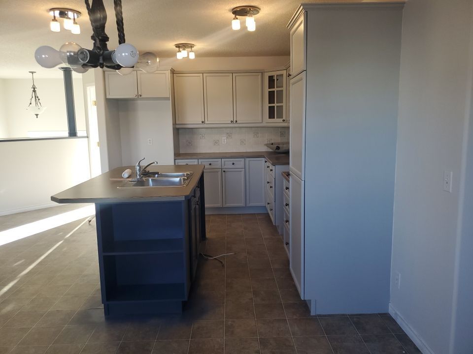 Orange Oak Cabinets Painted Two Tone after 4