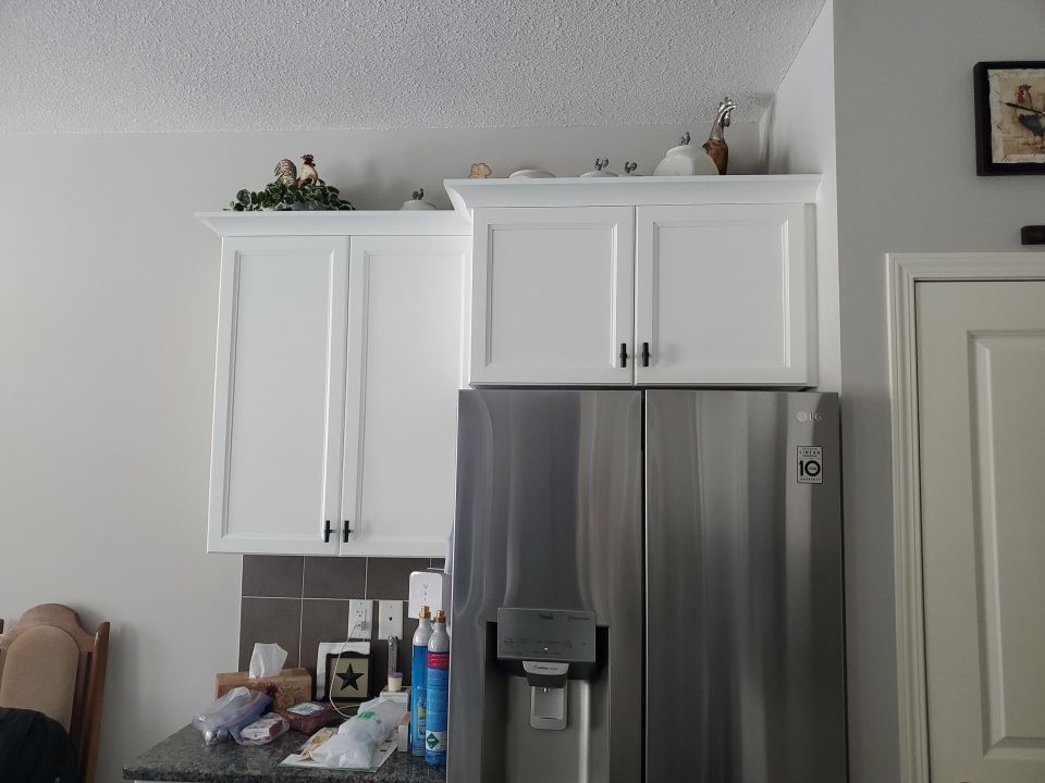 Dark Cabinets Repainted Off White after 5